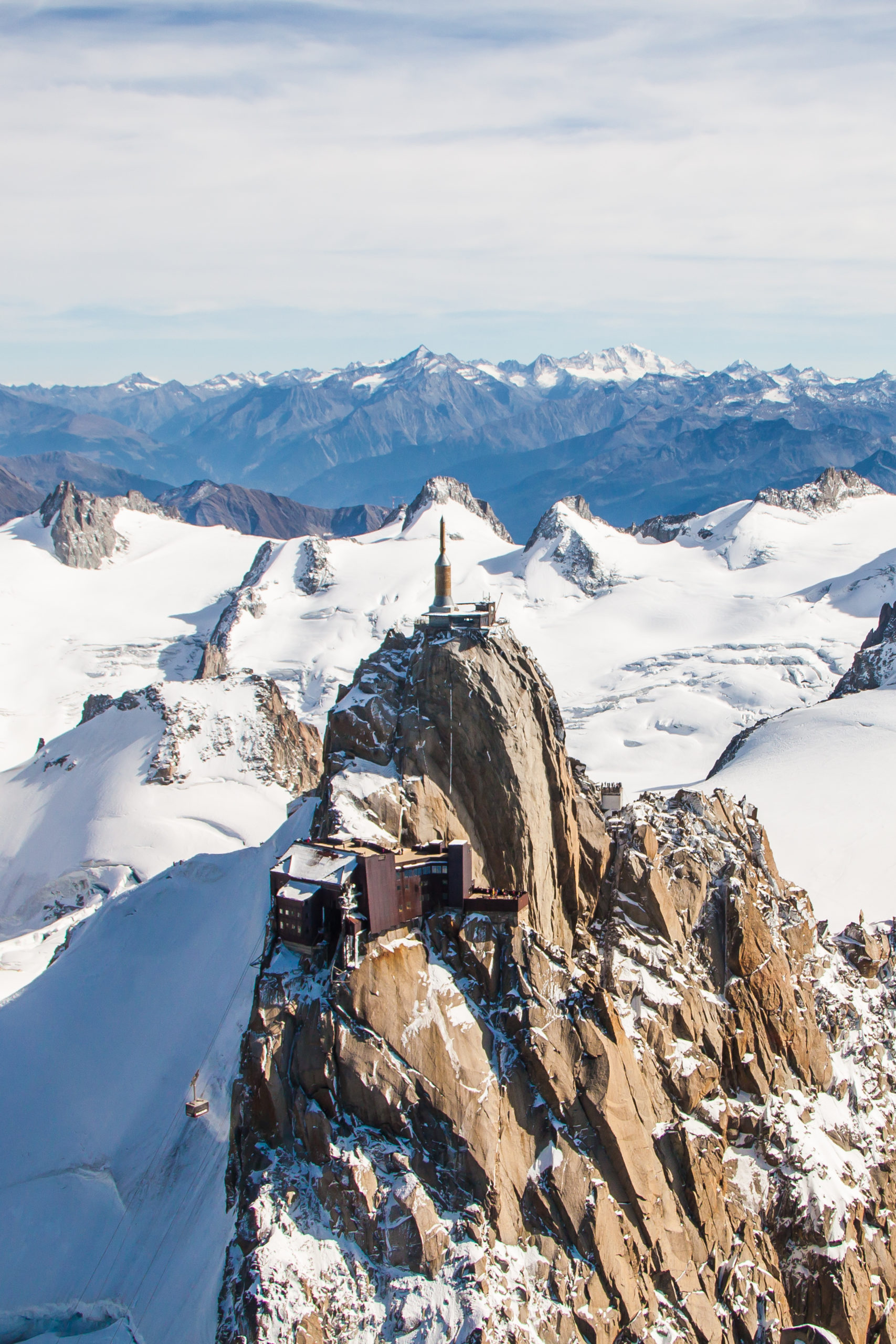 Altitude View of the Aiguille du Midi and the Snowy Alps Moutains Chain